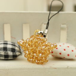 匠心獨(dú)運(yùn)，義烏小商品批發(fā)新寵——手工水晶元寶手機(jī)鏈熱銷探秘